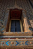 Bangkok Grand Palace,  Wat Phra Keow (temple of the Emerald Buddha). Detail of the decorations of the external walls of the ubosot. 